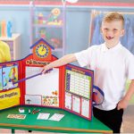 Child using the hand pointer from the Learning Resources Pretend And Play School Set