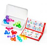 puzzle board, puzzle pieces and challenge booklet from the SmartGames IQ Link Puzzle