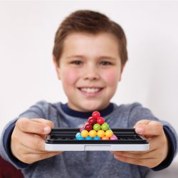Child holding SmartGames IQ Puzzler Pro