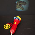 Projected dinosaur slide using the torch