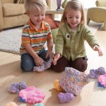2 children playing with Educational Insights Playfoam Modelling Beads 8 Pack