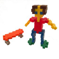 A figure and skateboard made using pieces from the Plus Plus Basic Mix Tube