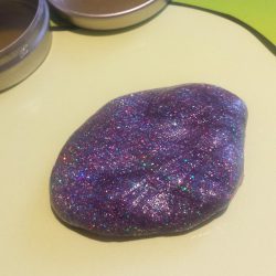 A blob of purple crazy Aaron's Thinking Putty mixed by me!