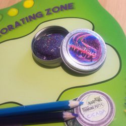 Finished tin with it's coloured in lid.