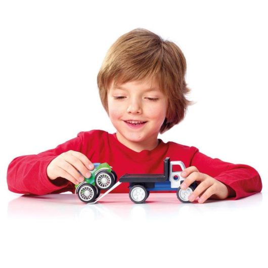 Child playing with the SmartMax Power Vehicles