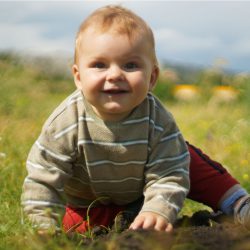 Sunshine and a young boy is smiling