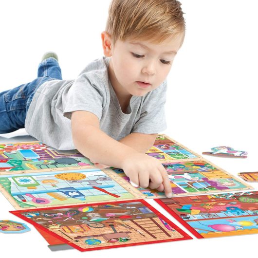 Child playing with the Montessori My Little House puzzle from Headu