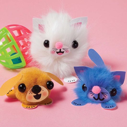 A cute puppy and kitty made from Klutz JR My Pom-Pom Pet Shop