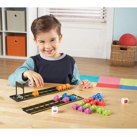 Child playing with Motor Maths Activity Game