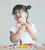 Child using Wikki Stix